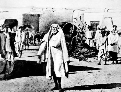 Baba on his bhiksha rounds, c.1916 Baba on his bhiksha rounds, c.1916